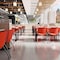 Flash Furniture HERCULES Series 880 lb. Capacity Orange Plastic Stack Chair with Titanium Gray Powder Coated Frame RUT-F01A-OR-GG - alternate 3